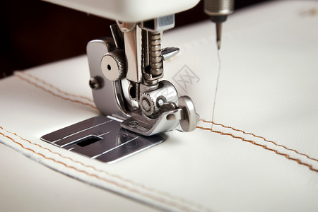 缝纫机缝制的织物背景图片