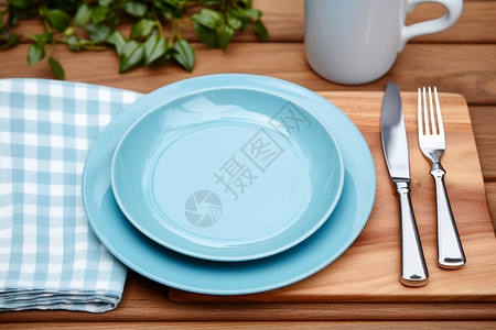 西餐桌蓝色调的西餐餐具背景