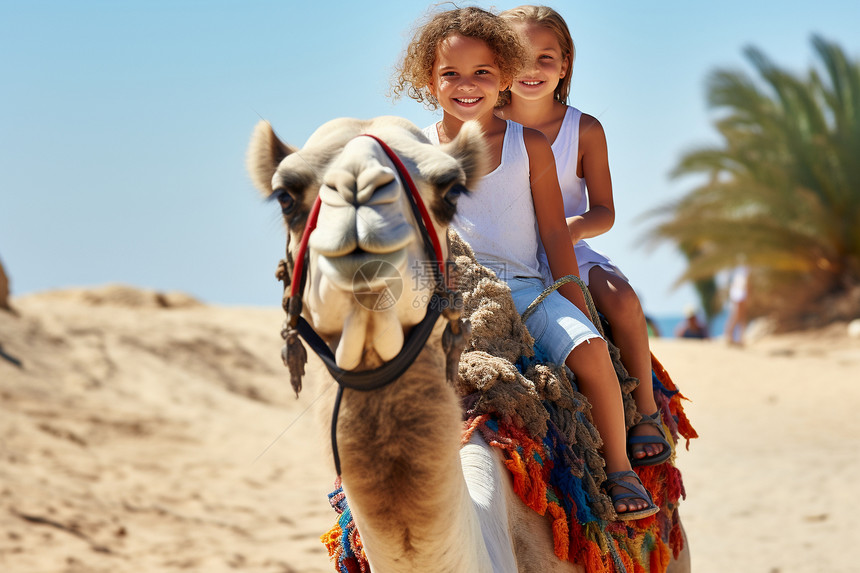 两个女孩骑着骆驼图片