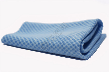 折叠的蓝色毛巾图片