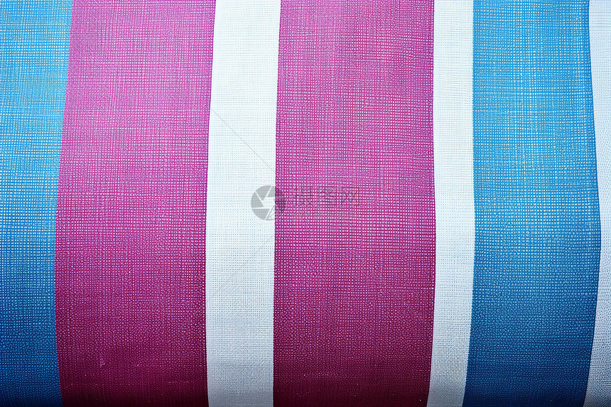 蓝粉相间的条纹布料织物图片