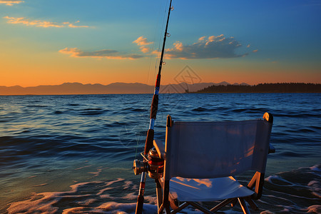 鱼竿落日时海边钓鱼的椅子背景