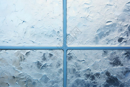 窗户玻璃上冰冻的冰花图片