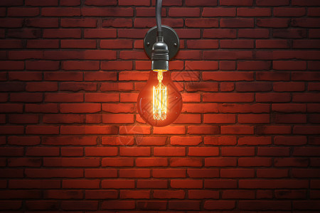 悬挂在红砖墙上的灯泡背景图片