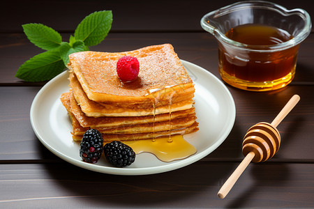 香甜健康的蜂蜜松饼高清图片