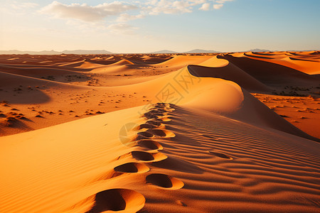 沙漠中孤独的脚印图片