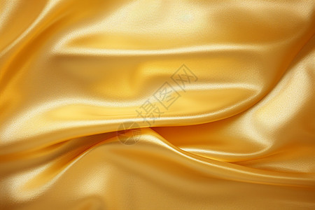 光滑的金色丝绸布料背景图片