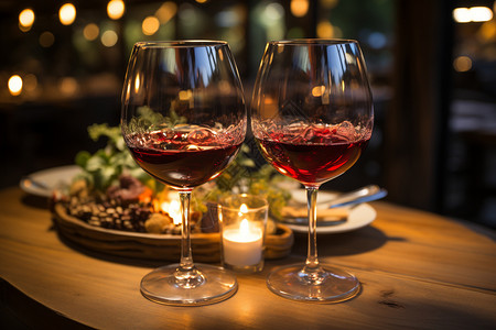 氛围感餐桌上的红酒背景图片