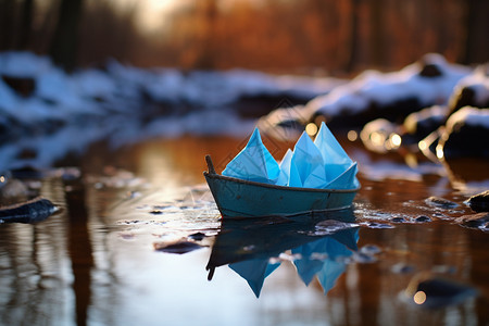 可爱的折纸小船冰雪中的小船背景