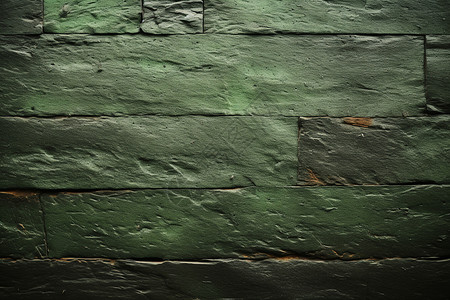 一面绿色的砖墙背景图片
