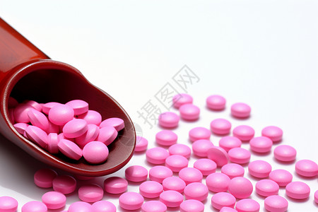 治疗疾病的粉色药丸背景图片