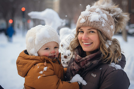 雪地里的孩子与母亲图片