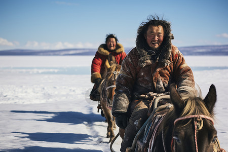 冬季雪地上骑马的牧民图片