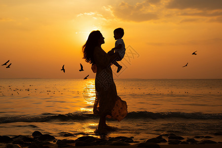 户外沙滩母子夕阳剪影背景