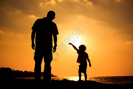 沙滩上玩耍的父子背景图片