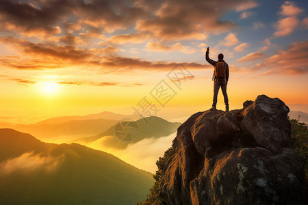 站在山顶上的攀登者背景图片