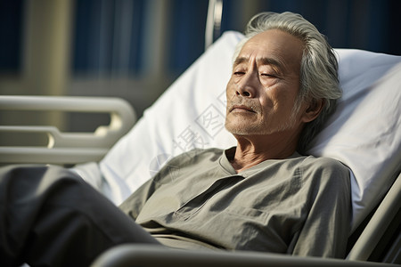 一个老年人躺在医院病床上背景图片