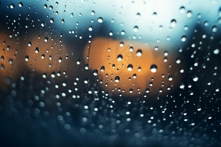 夜晚下的雨滴窗户背景图片