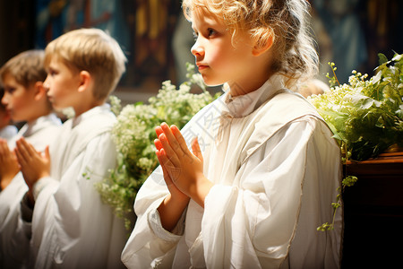 教堂中祈祷的儿童背景图片