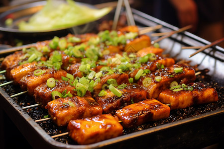 炸鱼豆腐串美味的烤串食物背景