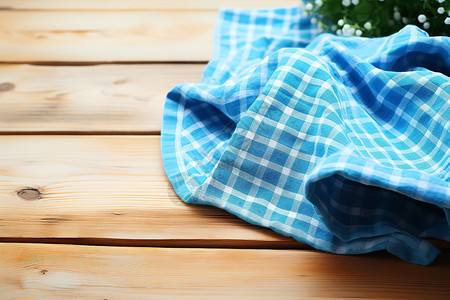 柔软的蓝色野餐布背景图片