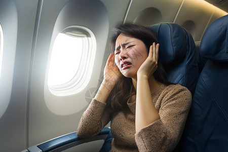 飞机舱内耳鸣的女子背景图片