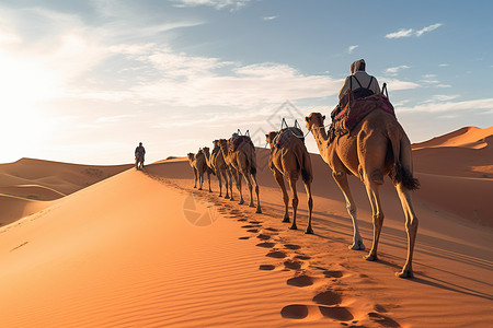 一群旅行的人沙漠中骑着骆驼的人背景