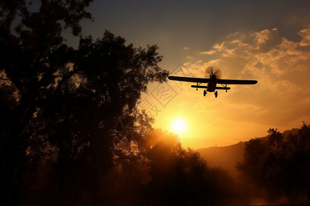 夕阳下低飞的飞机背景图片