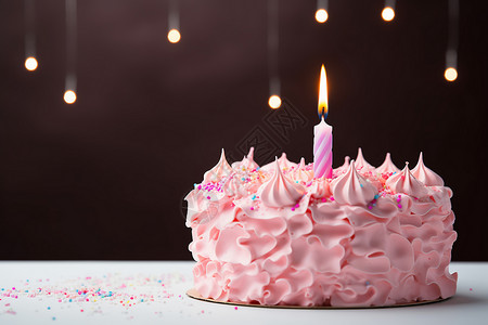 粉色蛋糕和蜡烛背景图片