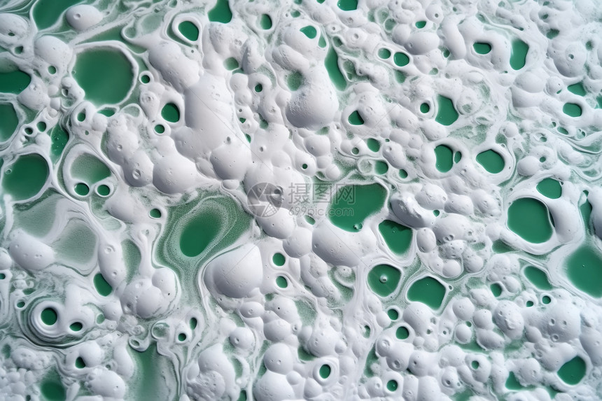 绿色液体中的白色气泡图片