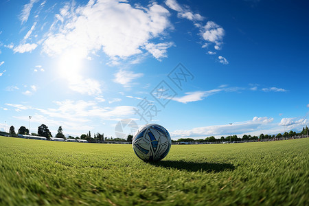 草坪中央的足球背景图片