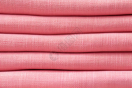 棉麻面料素材粉色的粗制纺织布料背景