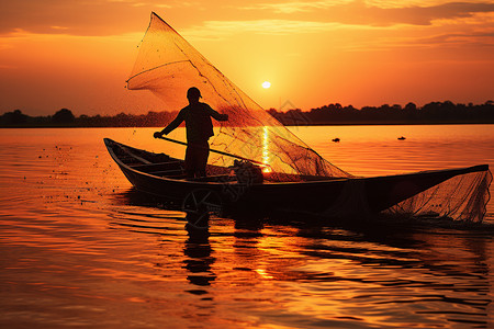 黄昏时带着渔网驾船在水上高清图片