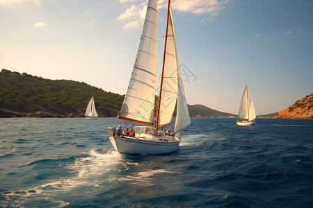 帆船群策驶在水中高清图片