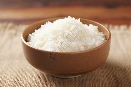 美味大米一碗稻草席上的饭背景
