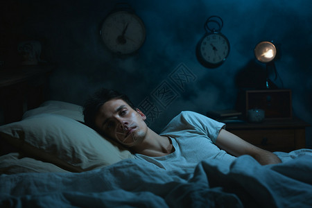 床上睡觉的男人背景图片