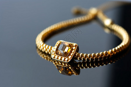 金手镯上的钻石背景图片