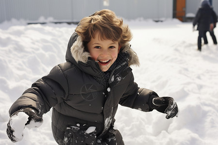 雪地里打雪仗的男孩背景图片