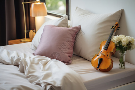 床头的小提琴背景图片