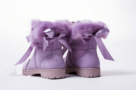 紫色蝴蝶结雪地靴背景图片