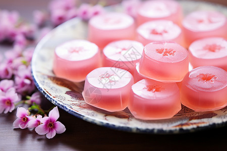 樱花果冻盘子里的甜品糖果背景