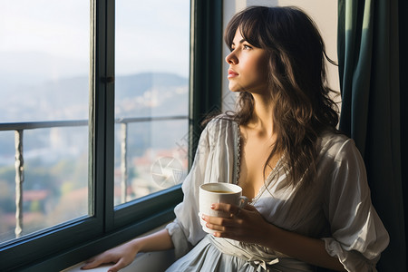 窗边喝咖啡的女子背景图片
