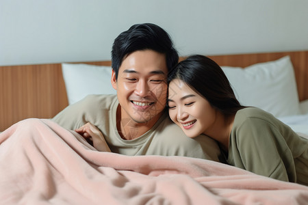 床上快乐的夫妇背景图片