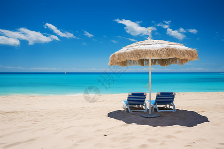 沙滩椅下蔽日遮阳伞背景图片