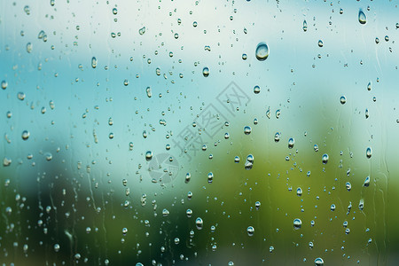 潮湿的天气雨中玻璃上的水珠背景