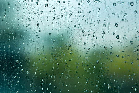 潮湿的天气雨中的玻璃窗背景