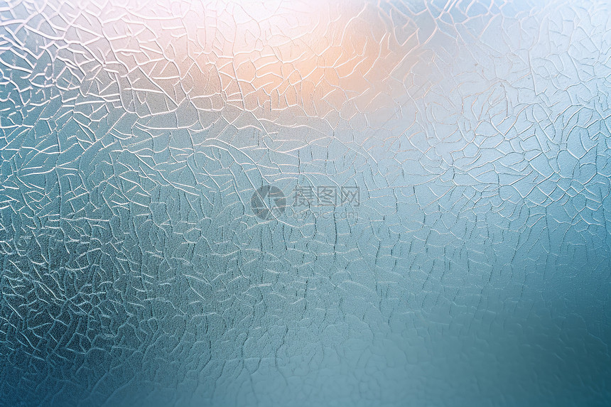 冰窗玻璃上的模糊背景图片