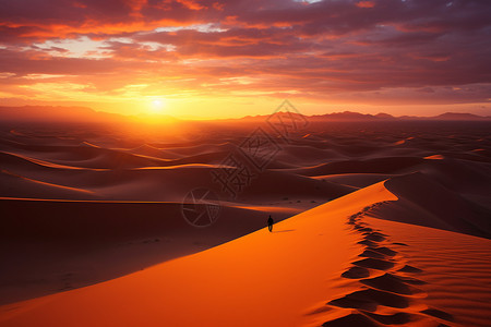 孤独行人沙漠日落中的孤独旅行者背景