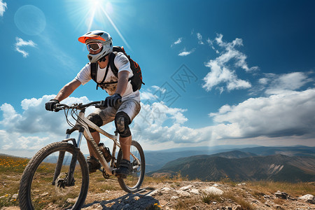 背包青年男子骑车登上山顶背景