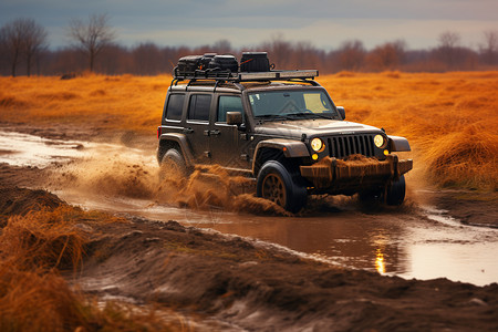 吉普车穿过泥泞的田野背景图片